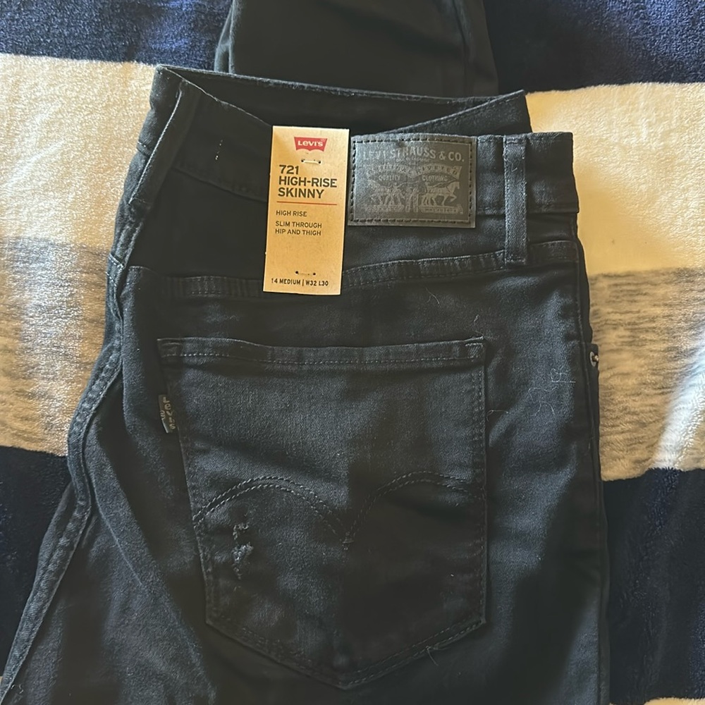 Levi black skinny jeans